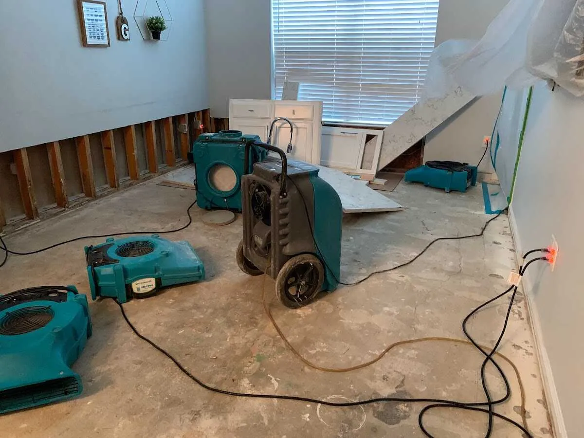 Dehumidifier in flood-cut room for Water Damage Restoration in Carlinville